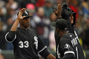 Edwin getting the W and Juan Pierre giving him a high five for his job well done.