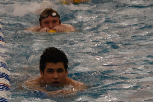 Improving boys swim team takes 1st at RB invite
