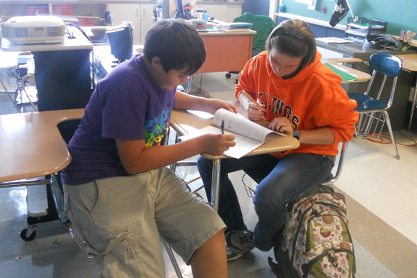 Here, Senior National Honors Society member, Christina Sauer, helps to tutor Sophomore, Jacob Koerner, with his homework.  A great example on how National Honors Society can help RB bulldogs with their homework.