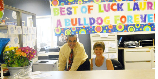 Administrative Assistant Lauren Presta and Assistant Principal John Passarella pose together on Presta's final day at RB.  Presta will be accepting another position in District 88.