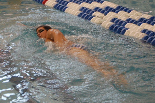 Sophomore Kevin Garza trains to shave seconds off of his freestyle times. 