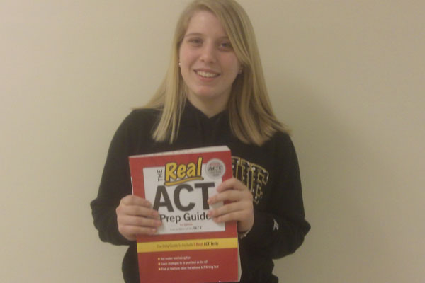 Liz Harrington with her practice ACT book.