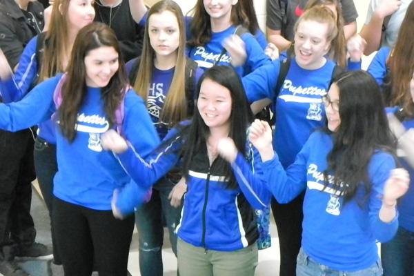 RB's band, cheerleaders, and Puppettes gathered at the main entrance to send the boys' swimmers off to State.  Preliminary heats will begin this evening at New Trier.