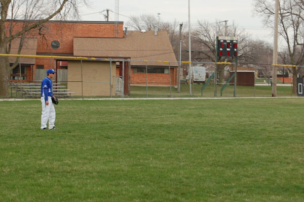 Senior Outfielder Luke Keller awaits a flyball in a conference matchup against the Ridgewood Rebels.