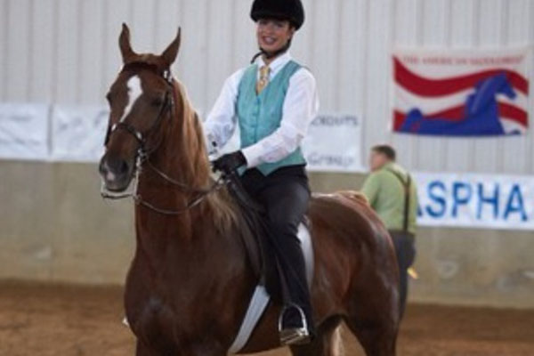 Escobedo, shown here riding her horse Lucy, has been riding competitively for four years.