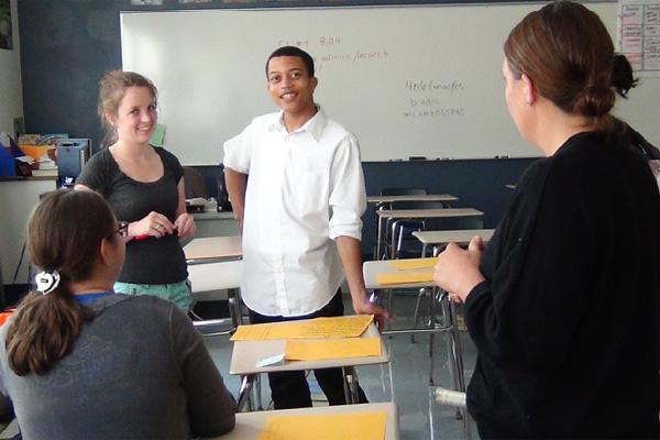 Second year sponsor Shannon Bradt gets organized for a new year of Speech Team.