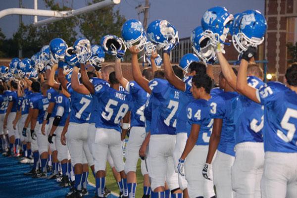 Football players still hold helmets high, even in the midst of their most recent heart wrenching loss to Ridgewood  