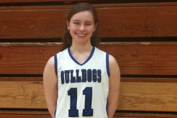 Emma Beener posing before a home game against Illiana Christian.