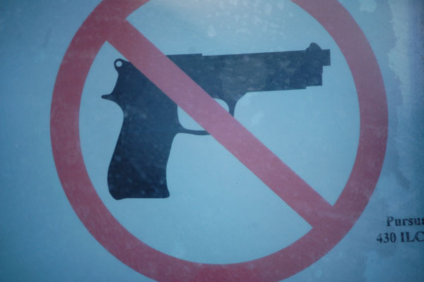 Locked doors, anti-gun signage new signs of school security