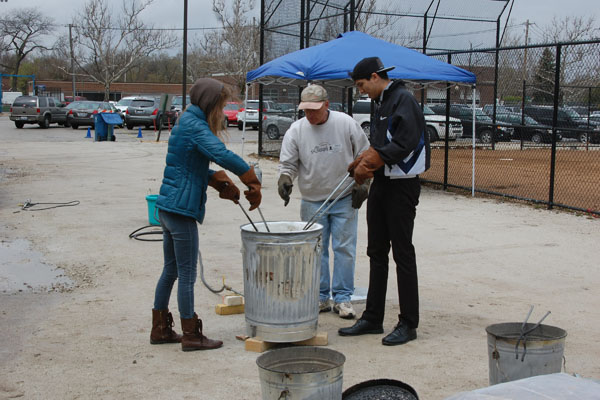 Once+the+weather+permitted%2C+Ceramics+students+took+to+the+baseball+field+to+try+their+hand+at+Raku+firing.