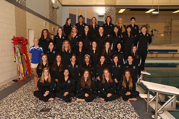 The girls swimming team poses for a team picture at the start of their season.
