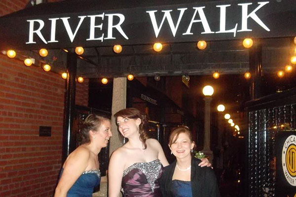 Former Clarion staffers Hannah Pecis and Candice Shelbrack pose with friend Emily Michl outside their 2013 Prom.  This Prom was held at Fultons on the River.  Starting this year, a new school policy states that Prom will continue to be held at the Intercontinental Hotel each year until further notice.