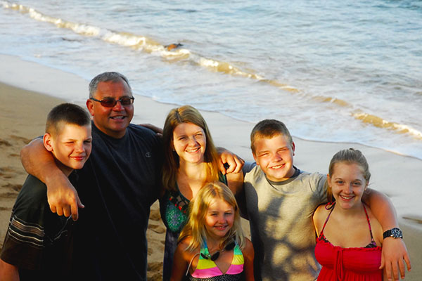 Filec and his family enjoy their vacation on the beaches of Hawaii.