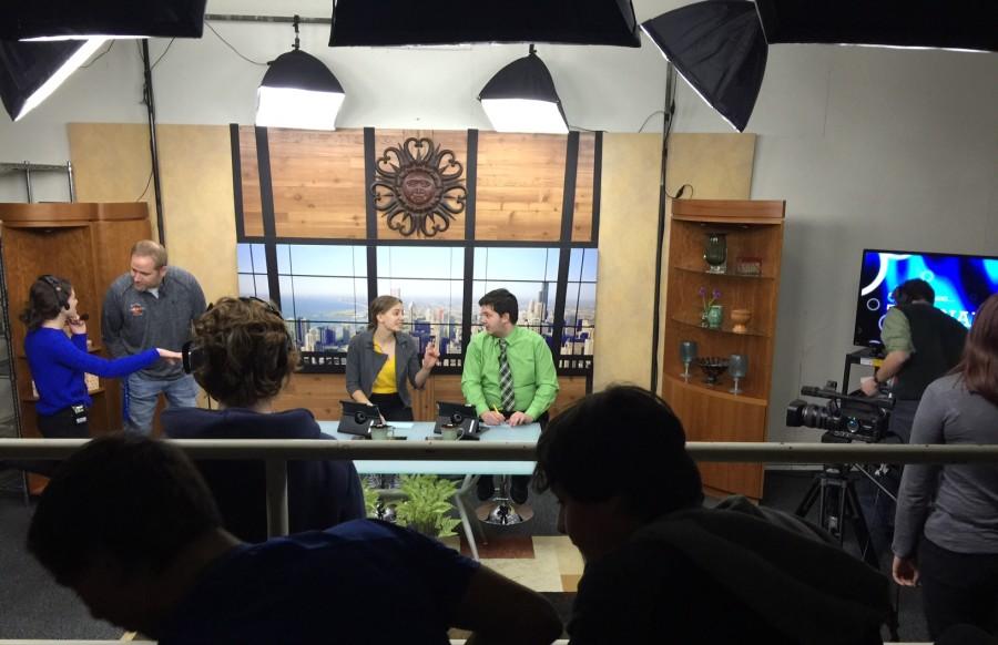The TV crew preps the studio  for the airing  of Talknado. 