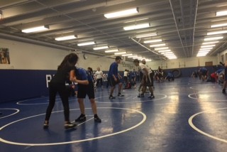 Girl wrestlers at practice. 