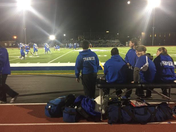 Student+athletic+trainers+in+action+during+a+RB+home+football+game.