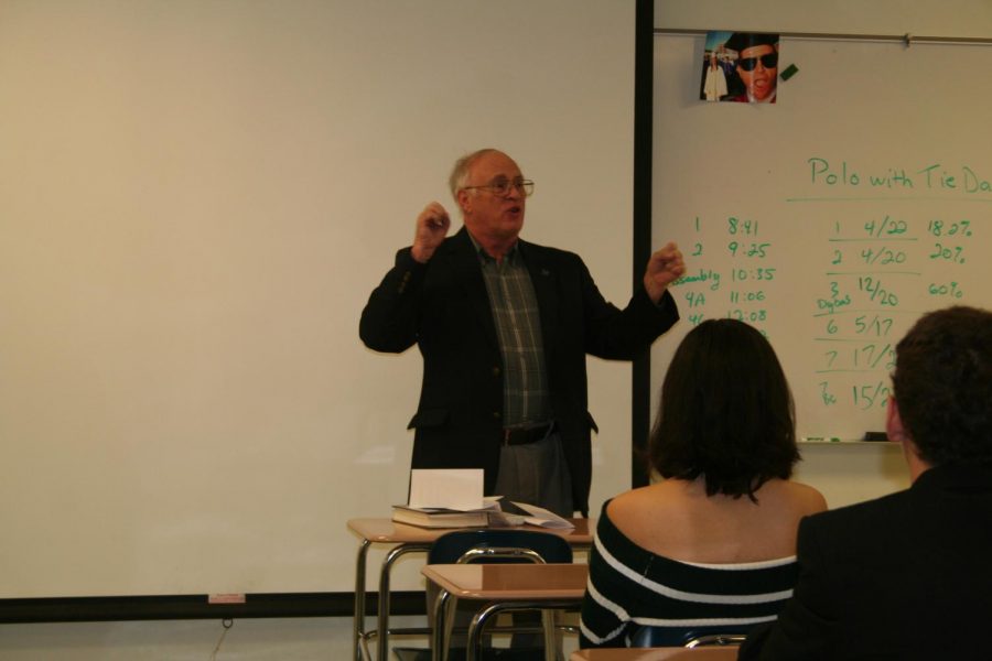 Henry Kannry speaks to students during a Veteran's Day classroom visit.