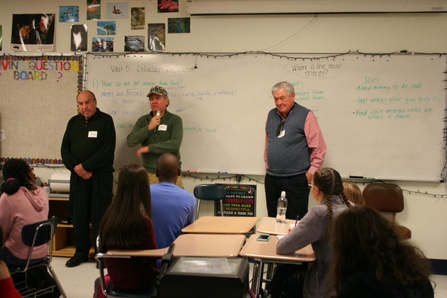 Mike Sammon speaking to students in room 115.