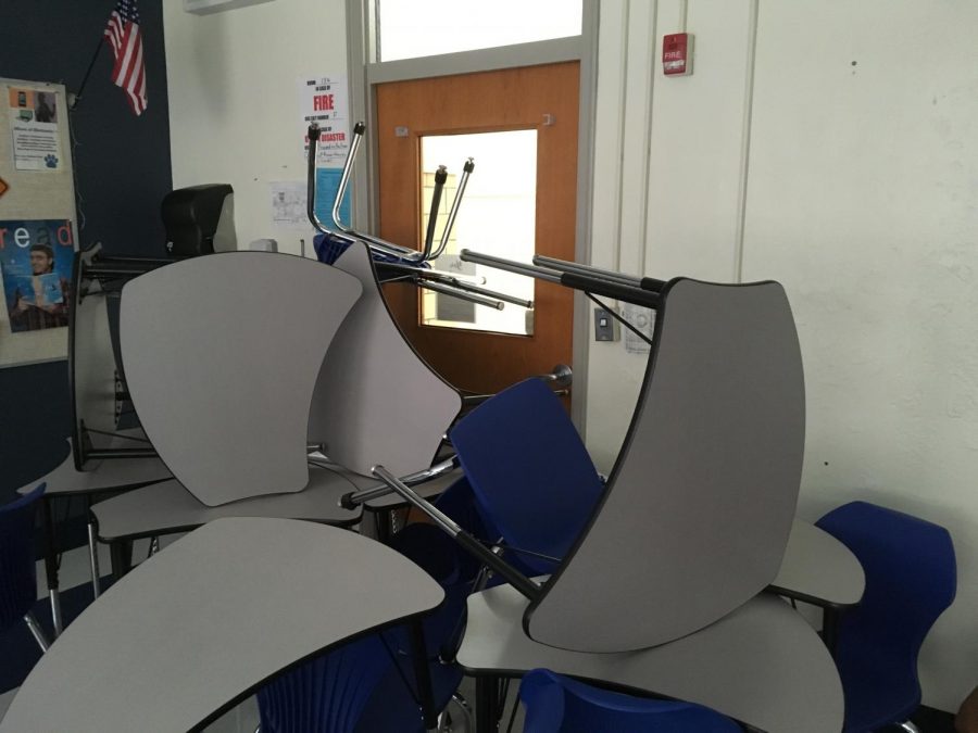 Chairs barricade the door during a lockdown drill.