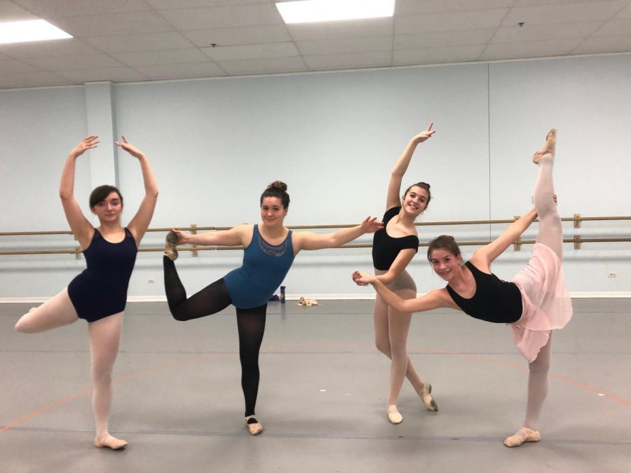Sarah attempting to do ballet with dancers in the class.