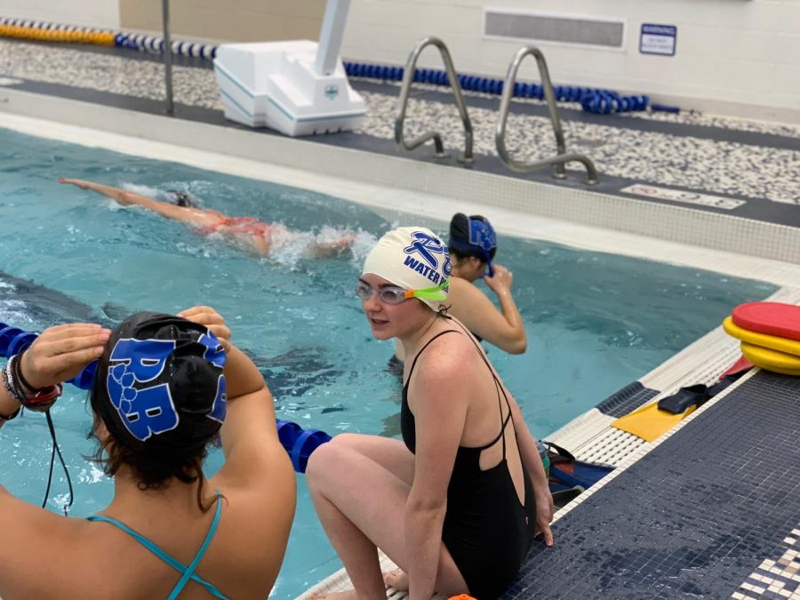 Bella anxiously entering the pool during practice.