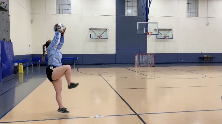 Moira Ford making a save during soccer practice.