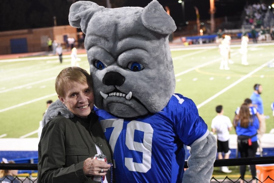 Jahnke+posing+with+the+RBHS+bulldog+mascot+at+one+of+the+football+games.+