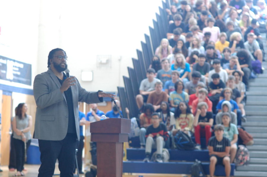 Terrence Lester gives a speech to students in the RB Main Gym.