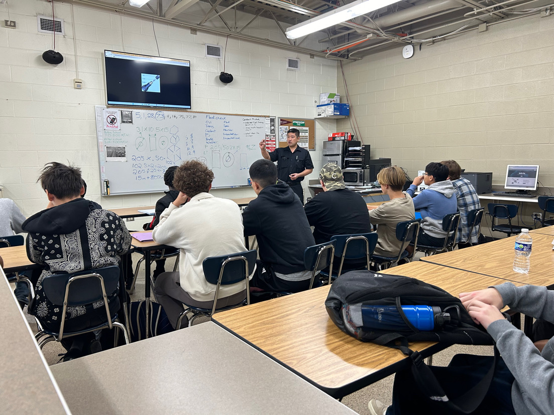 May teaching his automotive class.