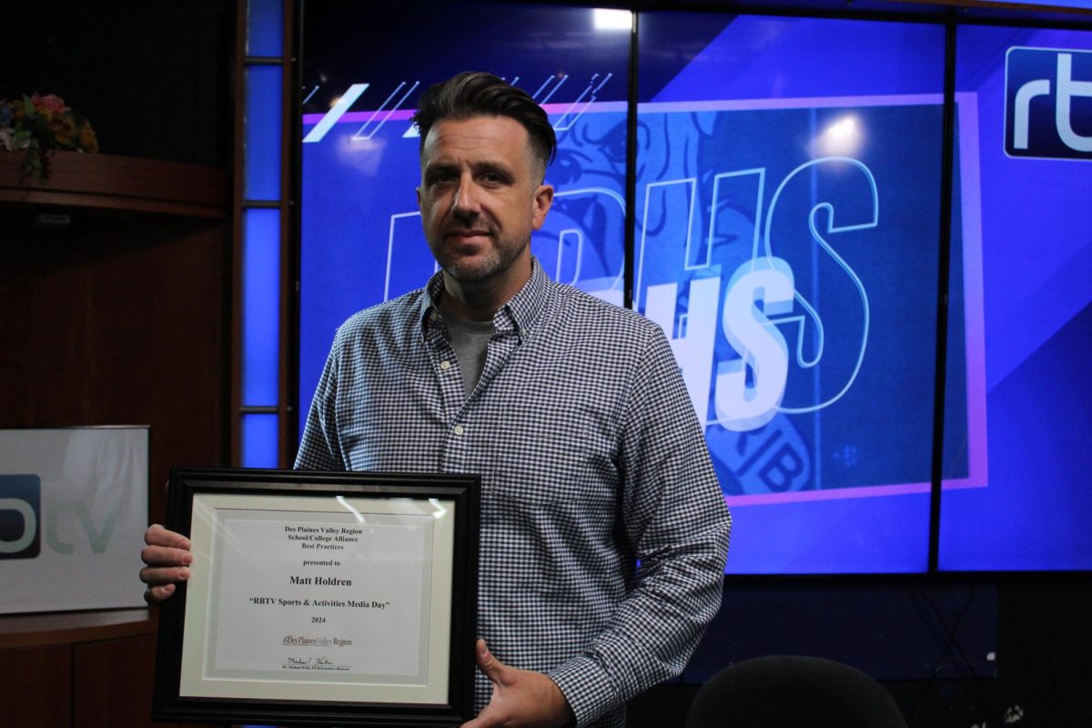 Holdren with his Best Practices award. 