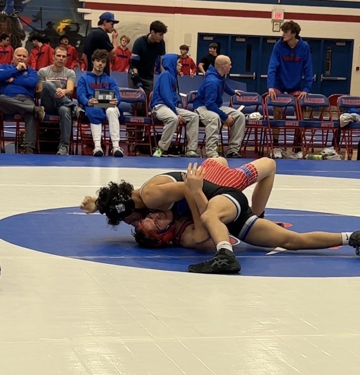 Mosquera during a wrestling match at a meet. Photo courtesy of Edgar Mosquera.