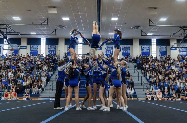 RB cheer preforming during a school pep rally.